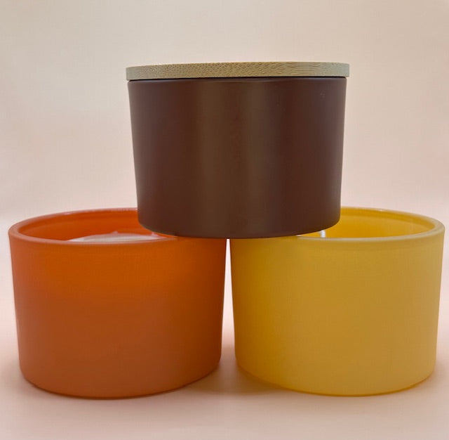 D. 4 Ounce Nature Inspired Colored Glass Jar with Walnut or Pine Lid